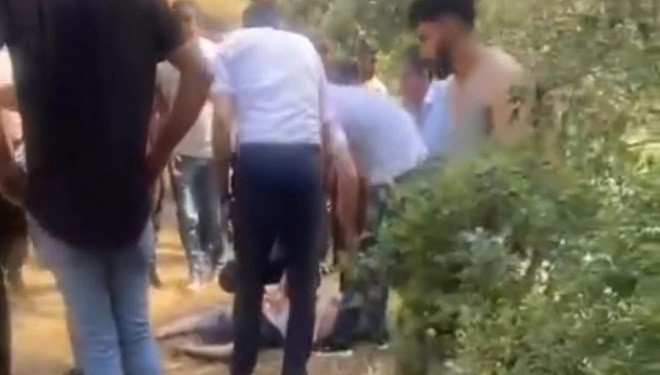 Dereye düşen çocuğunu kurtarmak isterken kendisi kurtulamadı
