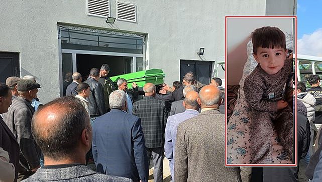 Köpeklerin saldırısında ölen çocuk toprağa verildi