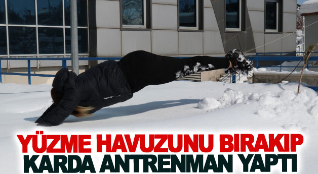 Yüzme havuzunu bırakıp karda antrenman yaptı